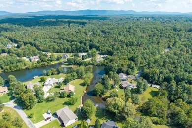 Wake up every day to the beauty of lakefront living in a on Lake Tansi Village Country Club in Tennessee - for sale on GolfHomes.com, golf home, golf lot