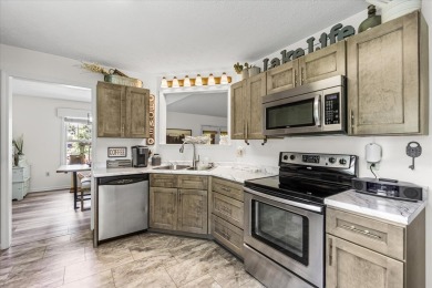 Wake up every day to the beauty of lakefront living in a on Lake Tansi Village Country Club in Tennessee - for sale on GolfHomes.com, golf home, golf lot