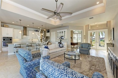 Fall in love with this 2015 built custom waterfront pool home on Saint Andrews South Golf Club in Florida - for sale on GolfHomes.com, golf home, golf lot