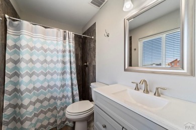 This charming 3-bed, 2-bath ranch offers modern finishes, a on Hollydot Golf Course in Colorado - for sale on GolfHomes.com, golf home, golf lot