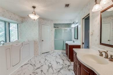 New flooring in living room, kitchen 2 bedrooms and 2 bathrooms on Texas Rangers Golf Club  in Texas - for sale on GolfHomes.com, golf home, golf lot