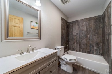 This charming 3-bed, 2-bath ranch offers modern finishes, a on Hollydot Golf Course in Colorado - for sale on GolfHomes.com, golf home, golf lot