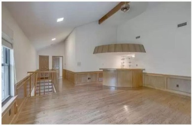 New flooring in living room, kitchen 2 bedrooms and 2 bathrooms on Texas Rangers Golf Club  in Texas - for sale on GolfHomes.com, golf home, golf lot