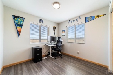 This charming 3-bed, 2-bath ranch offers modern finishes, a on Hollydot Golf Course in Colorado - for sale on GolfHomes.com, golf home, golf lot