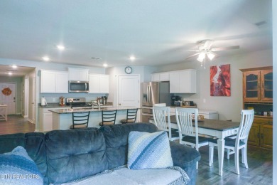 Kitchen boasts spacious cabinetry and Stainless Whirlpool range on Millstone Golf Club in Tennessee - for sale on GolfHomes.com, golf home, golf lot