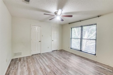 New flooring in living room, kitchen 2 bedrooms and 2 bathrooms on Texas Rangers Golf Club  in Texas - for sale on GolfHomes.com, golf home, golf lot