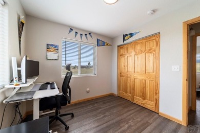 This charming 3-bed, 2-bath ranch offers modern finishes, a on Hollydot Golf Course in Colorado - for sale on GolfHomes.com, golf home, golf lot