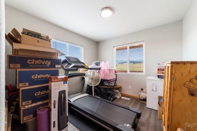 This charming 3-bed, 2-bath ranch offers modern finishes, a on Hollydot Golf Course in Colorado - for sale on GolfHomes.com, golf home, golf lot