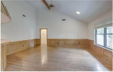 New flooring in living room, kitchen 2 bedrooms and 2 bathrooms on Texas Rangers Golf Club  in Texas - for sale on GolfHomes.com, golf home, golf lot