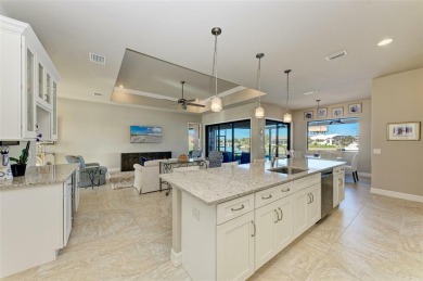 Fall in love with this 2015 built custom waterfront pool home on Saint Andrews South Golf Club in Florida - for sale on GolfHomes.com, golf home, golf lot