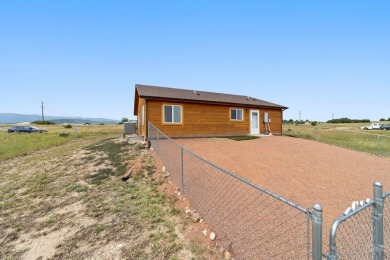 This charming 3-bed, 2-bath ranch offers modern finishes, a on Hollydot Golf Course in Colorado - for sale on GolfHomes.com, golf home, golf lot