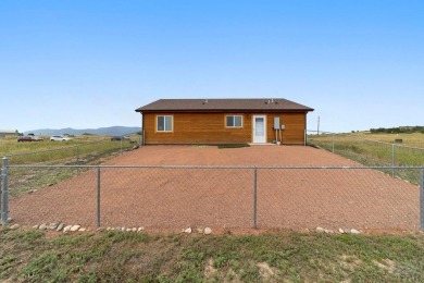 This charming 3-bed, 2-bath ranch offers modern finishes, a on Hollydot Golf Course in Colorado - for sale on GolfHomes.com, golf home, golf lot