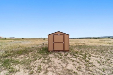 This charming 3-bed, 2-bath ranch offers modern finishes, a on Hollydot Golf Course in Colorado - for sale on GolfHomes.com, golf home, golf lot