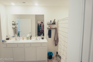 Kitchen boasts spacious cabinetry and Stainless Whirlpool range on Millstone Golf Club in Tennessee - for sale on GolfHomes.com, golf home, golf lot