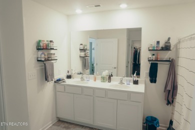 Kitchen boasts spacious cabinetry and Stainless Whirlpool range on Millstone Golf Club in Tennessee - for sale on GolfHomes.com, golf home, golf lot
