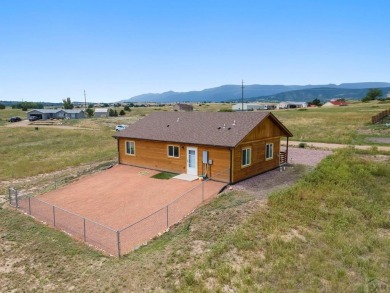 This charming 3-bed, 2-bath ranch offers modern finishes, a on Hollydot Golf Course in Colorado - for sale on GolfHomes.com, golf home, golf lot