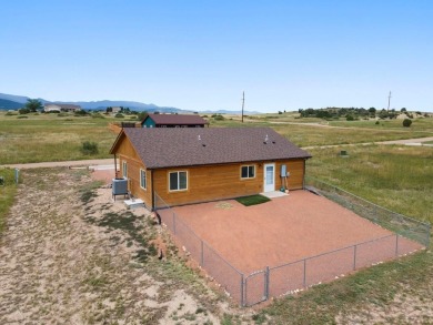 This charming 3-bed, 2-bath ranch offers modern finishes, a on Hollydot Golf Course in Colorado - for sale on GolfHomes.com, golf home, golf lot