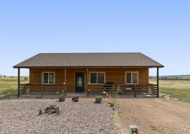 This charming 3-bed, 2-bath ranch offers modern finishes, a on Hollydot Golf Course in Colorado - for sale on GolfHomes.com, golf home, golf lot