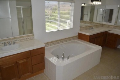 Step into a Luxurious lifestyle as you open the door to this on Twin Oaks Golf Course in California - for sale on GolfHomes.com, golf home, golf lot