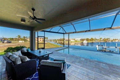 Fall in love with this 2015 built custom waterfront pool home on Saint Andrews South Golf Club in Florida - for sale on GolfHomes.com, golf home, golf lot