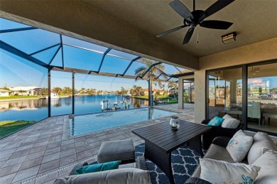 Fall in love with this 2015 built custom waterfront pool home on Saint Andrews South Golf Club in Florida - for sale on GolfHomes.com, golf home, golf lot