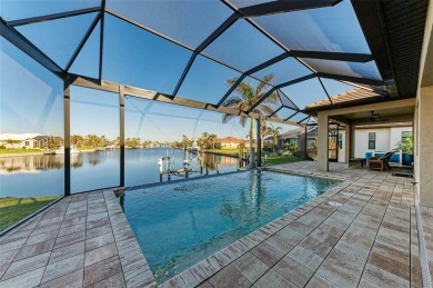 Fall in love with this 2015 built custom waterfront pool home on Saint Andrews South Golf Club in Florida - for sale on GolfHomes.com, golf home, golf lot