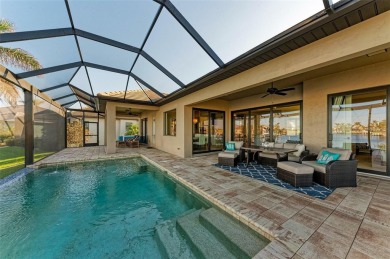 Fall in love with this 2015 built custom waterfront pool home on Saint Andrews South Golf Club in Florida - for sale on GolfHomes.com, golf home, golf lot