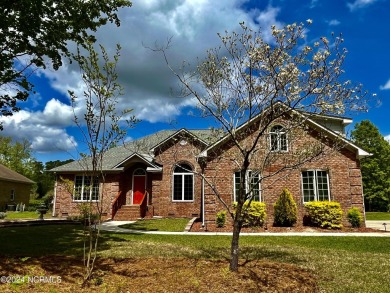Great curb appeal in this custom built brick home on the 16th on Emerald Golf Club in North Carolina - for sale on GolfHomes.com, golf home, golf lot