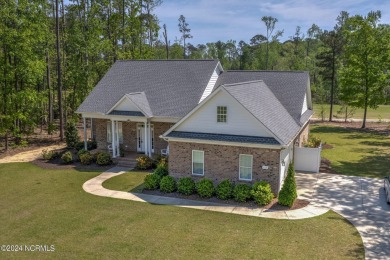If you love a custom split floorplan one-story home with on The Golf Club At Rocky Mount in North Carolina - for sale on GolfHomes.com, golf home, golf lot