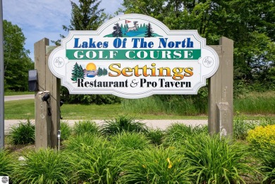 Discover 1.7 acres of beautifully wooded land, conveniently on Lakes of the North Deer Run Golf Course in Michigan - for sale on GolfHomes.com, golf home, golf lot