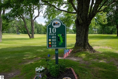 Discover 1.7 acres of beautifully wooded land, conveniently on Lakes of the North Deer Run Golf Course in Michigan - for sale on GolfHomes.com, golf home, golf lot