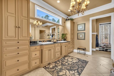 Elegant Waterfront Living in Plantation Community! Nestled on The Patriot Golf Club At Grand Harbor in South Carolina - for sale on GolfHomes.com, golf home, golf lot