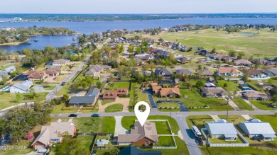 Always dreamed of a home with a white picket fence? This corner on Panama Country Club in Florida - for sale on GolfHomes.com, golf home, golf lot