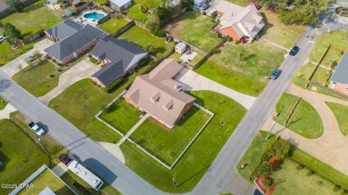 Always dreamed of a home with a white picket fence? This corner on Panama Country Club in Florida - for sale on GolfHomes.com, golf home, golf lot