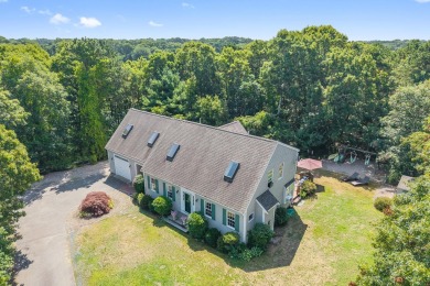Spacious Cape with 3 bedrooms, 2.5 baths, and an inviting on Falmouth Country Club and Golf Courses in Massachusetts - for sale on GolfHomes.com, golf home, golf lot