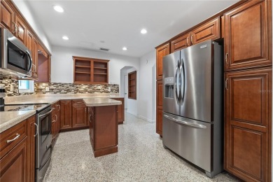 Welcome to this beautifully maintained 3-bedroom, 2-bathroom on Babe Zaharias Golf Course in Florida - for sale on GolfHomes.com, golf home, golf lot