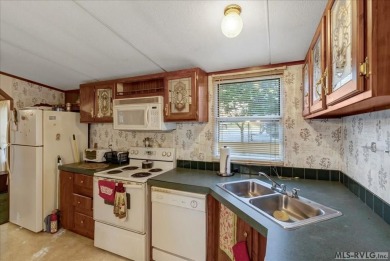 Discover comfort, convenience, and community in this 3-bedroom on River Ridge Golf Club in Virginia - for sale on GolfHomes.com, golf home, golf lot