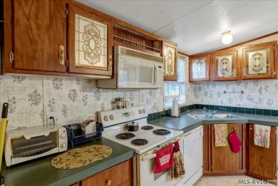 Discover comfort, convenience, and community in this 3-bedroom on River Ridge Golf Club in Virginia - for sale on GolfHomes.com, golf home, golf lot