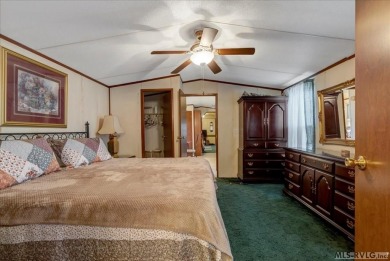 Discover comfort, convenience, and community in this 3-bedroom on River Ridge Golf Club in Virginia - for sale on GolfHomes.com, golf home, golf lot