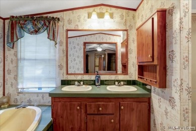 Discover comfort, convenience, and community in this 3-bedroom on River Ridge Golf Club in Virginia - for sale on GolfHomes.com, golf home, golf lot