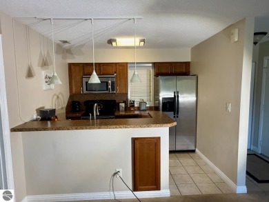 Located at Grand Traverse Resort & Spa, the Terrace Condominiums on  in Michigan - for sale on GolfHomes.com, golf home, golf lot