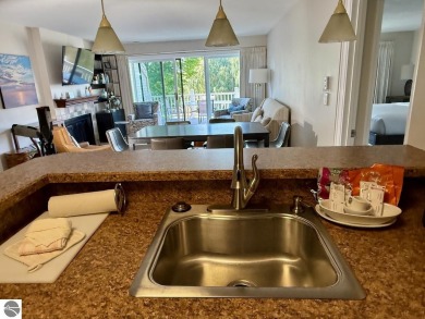 Located at Grand Traverse Resort & Spa, the Terrace Condominiums on  in Michigan - for sale on GolfHomes.com, golf home, golf lot