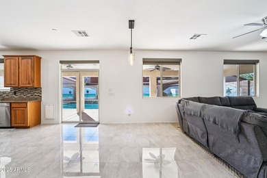 Welcome to your dream home! This stunning 5-bedroom, 3-bath on The Golf Club At Johnson Ranch in Arizona - for sale on GolfHomes.com, golf home, golf lot