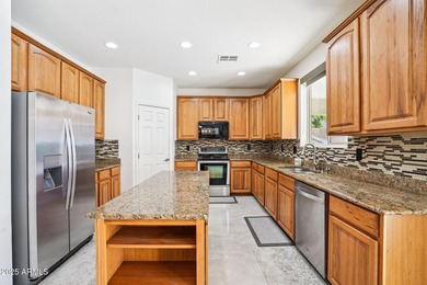 Welcome to your dream home! This stunning 5-bedroom, 3-bath on The Golf Club At Johnson Ranch in Arizona - for sale on GolfHomes.com, golf home, golf lot