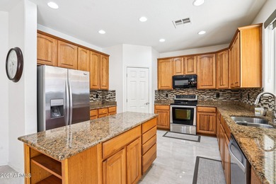 Welcome to your dream home! This stunning 5-bedroom, 3-bath on The Golf Club At Johnson Ranch in Arizona - for sale on GolfHomes.com, golf home, golf lot