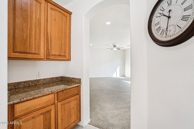 Welcome to your dream home! This stunning 5-bedroom, 3-bath on The Golf Club At Johnson Ranch in Arizona - for sale on GolfHomes.com, golf home, golf lot