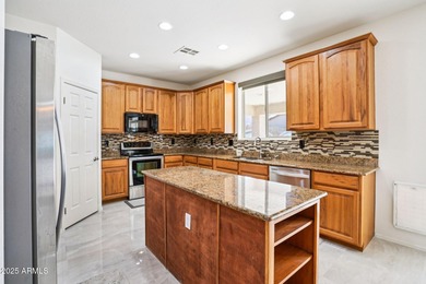 Welcome to your dream home! This stunning 5-bedroom, 3-bath on The Golf Club At Johnson Ranch in Arizona - for sale on GolfHomes.com, golf home, golf lot