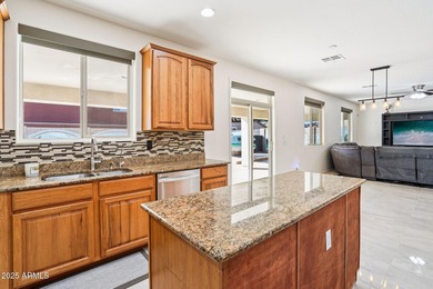 Welcome to your dream home! This stunning 5-bedroom, 3-bath on The Golf Club At Johnson Ranch in Arizona - for sale on GolfHomes.com, golf home, golf lot