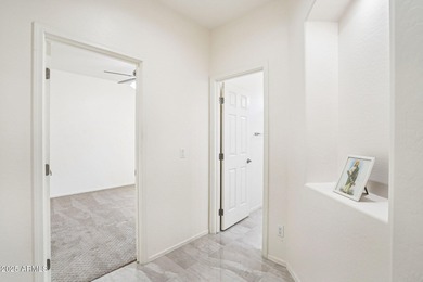 Welcome to your dream home! This stunning 5-bedroom, 3-bath on The Golf Club At Johnson Ranch in Arizona - for sale on GolfHomes.com, golf home, golf lot