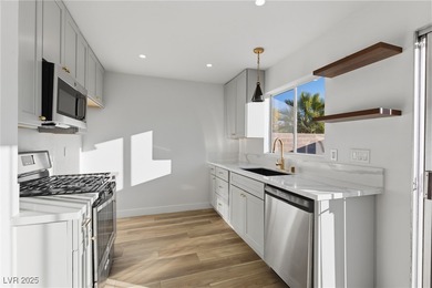 Enjoy this newly remodeled, single-story townhouse  with a new on Desert Rose Golf Course in Nevada - for sale on GolfHomes.com, golf home, golf lot